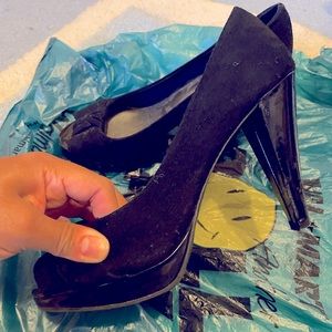 Fioni black peep-toed no-strap stiletto heels